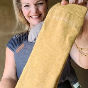 Hoppediz Merino-Babytragestulpen gold